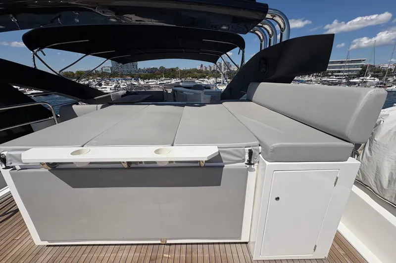 Yacht Photos Pics Sunseeker 86 Yacht 2018 deck with cushioned seating and marina view.