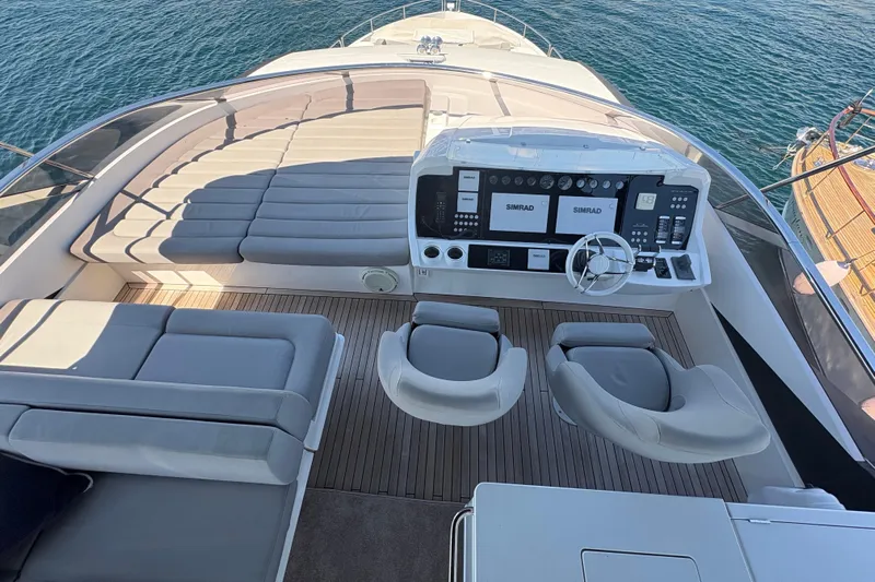  Yacht Photos Pics Luxurious 2018 Sunseeker 86 Yacht helm with plush seating and advanced navigation systems.