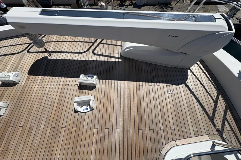 Yacht Photos Pics Sunseeker 86 Yacht 2018 deck with crane and wooden flooring.