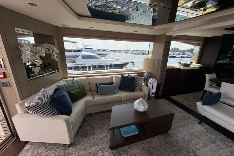  Yacht Photos Pics Luxurious interior of 2018 Sunseeker 86 Yacht with elegant seating and waterfront view.