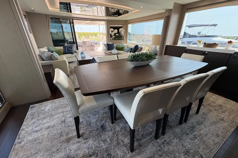  Yacht Photos Pics Luxurious interior of 2018 Sunseeker 86 Yacht with elegant dining area and plush seating.
