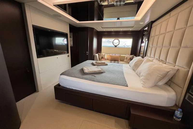  Yacht Photos Pics Luxurious bedroom interior of 2018 Sunseeker 86 Yacht with elegant furnishings and modern design.
