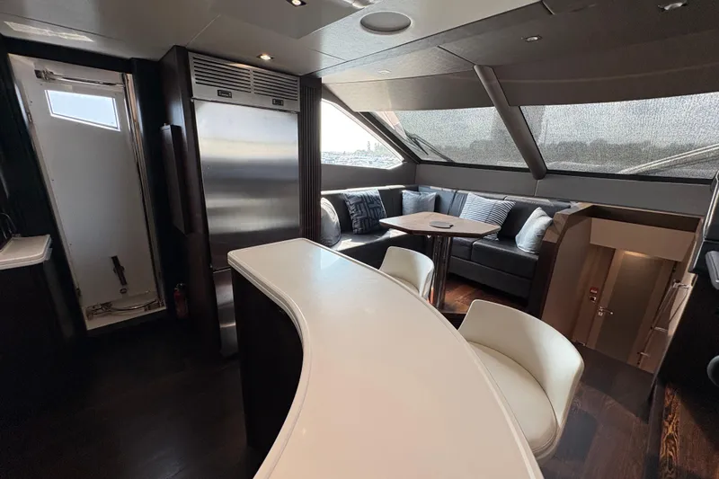  Yacht Photos Pics Luxurious interior of 2018 Sunseeker 86 Yacht with modern seating and sleek design.