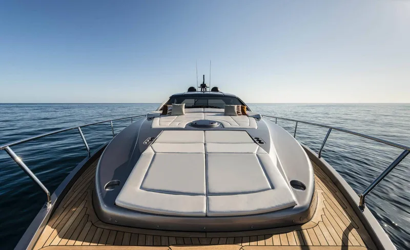  Yacht Photos Pics 2023 Pershing 6X yacht on open sea, showcasing sleek design and luxury features.