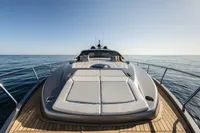 2023 Pershing 6X yacht on open sea, showcasing sleek design and luxury features.