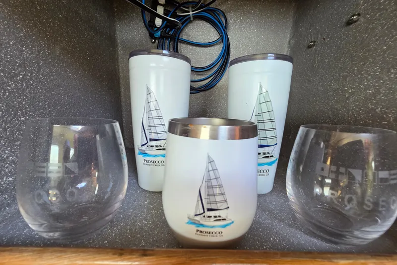 Prosecco Yacht Photos Pics Sailing-themed tumblers and glasses in a Seawind 1000 catamaran, 1997 model.