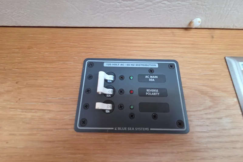 Prosecco Yacht Photos Pics Electrical panel on 1997 Seawind 1000 catamaran, featuring Blue Sea Systems components.