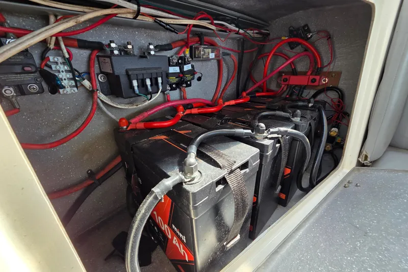 Prosecco Yacht Photos Pics Electrical system of a 1997 Seawind 1000 catamaran, featuring batteries and wiring.