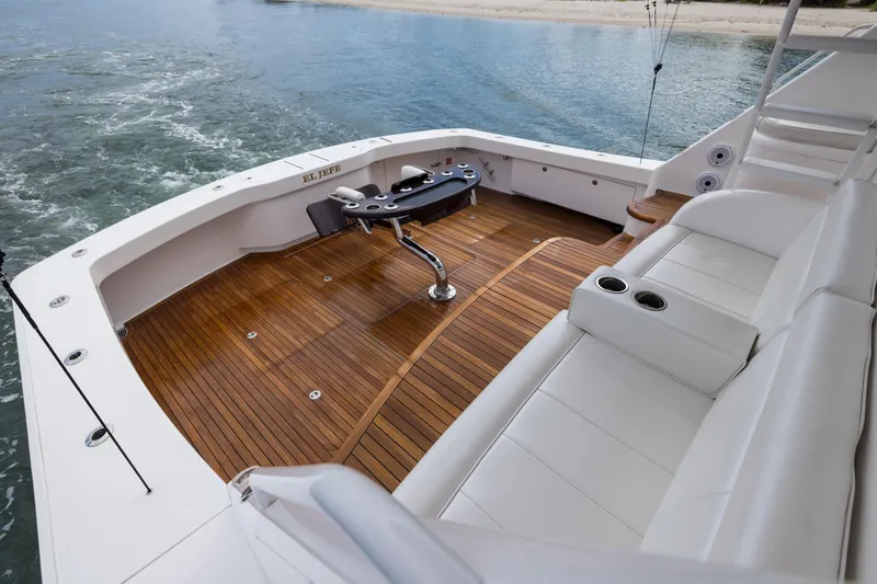 "el Jefe" Yacht Photos Pics Luxurious 2014 Viking 70 Convertible yacht deck with teak flooring and comfortable seating.