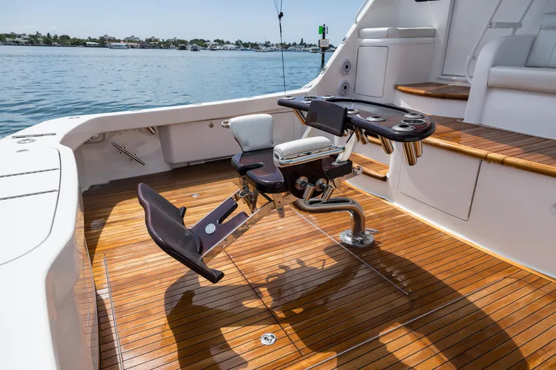 "el Jefe" Yacht Photos Pics 2014 Viking 70 Convertible yacht with teak deck and fishing chair.