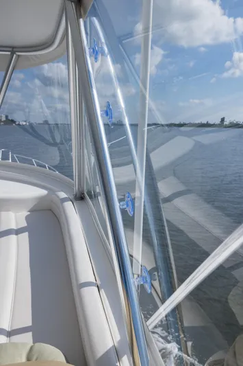 "el Jefe" Yacht Photos Pics 2014 Viking 70 Convertible yacht with clear view of ocean and sky.