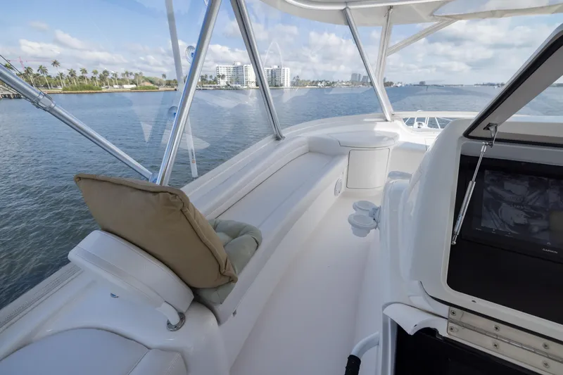 "el Jefe" Yacht Photos Pics 2014 Viking 70 Convertible yacht interior with ocean view and modern seating.