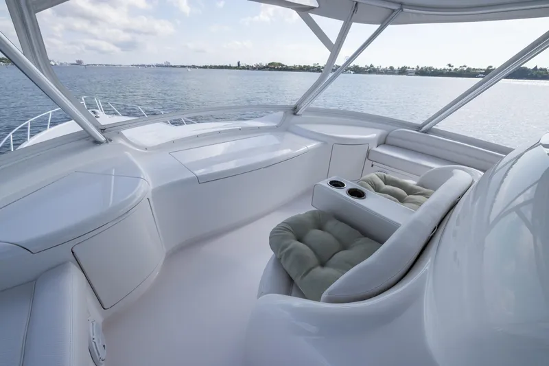 "el Jefe" Yacht Photos Pics Luxurious interior of 2014 Viking 70 Convertible yacht with plush seating and ocean view.