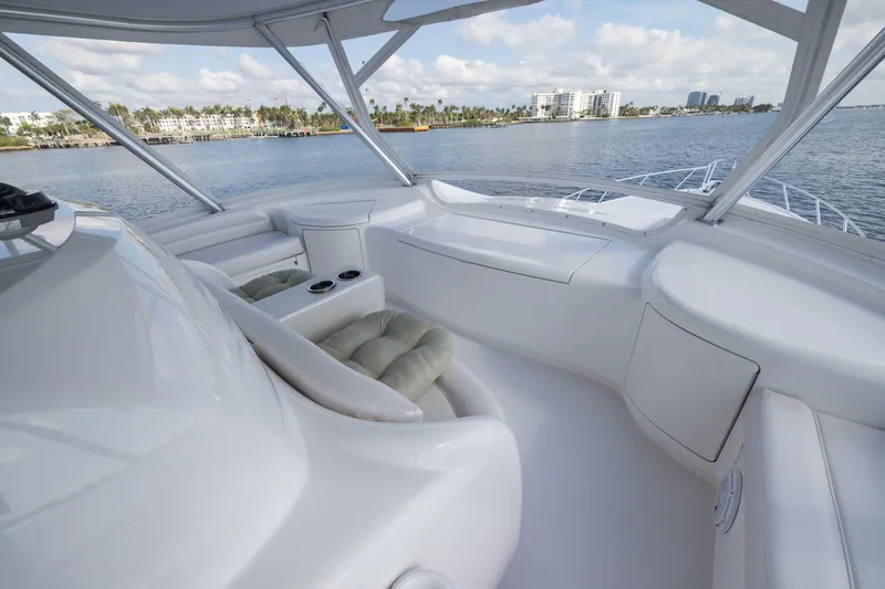 "el Jefe" Yacht Photos Pics Luxurious 2014 Viking 70 Convertible yacht interior with plush seating and ocean view.