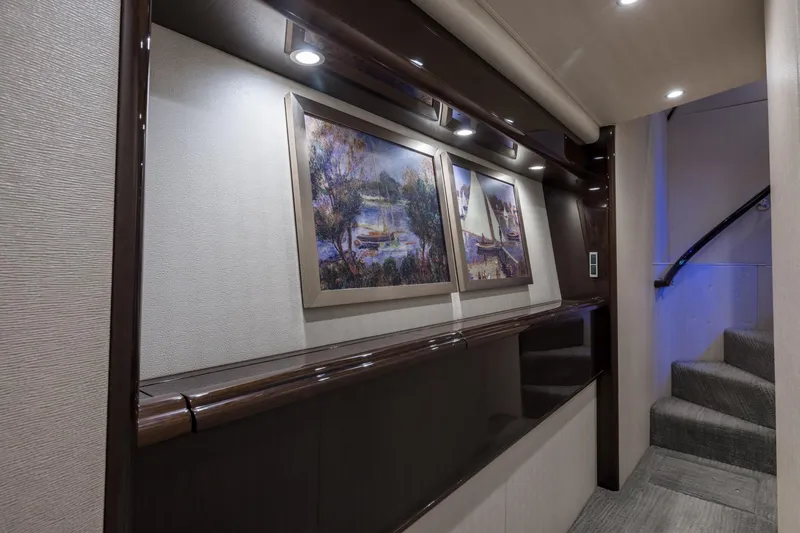 "el Jefe" Yacht Photos Pics Luxurious interior of 2014 Viking 70 Convertible yacht with elegant artwork and modern lighting.