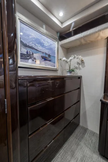 "el Jefe" Yacht Photos Pics Luxurious interior of 2014 Viking 70 Convertible yacht with elegant wood cabinetry.