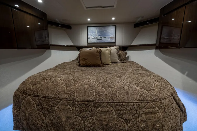 "el Jefe" Yacht Photos Pics Luxurious bedroom interior of 2014 Viking 70 Convertible yacht with elegant bedding.