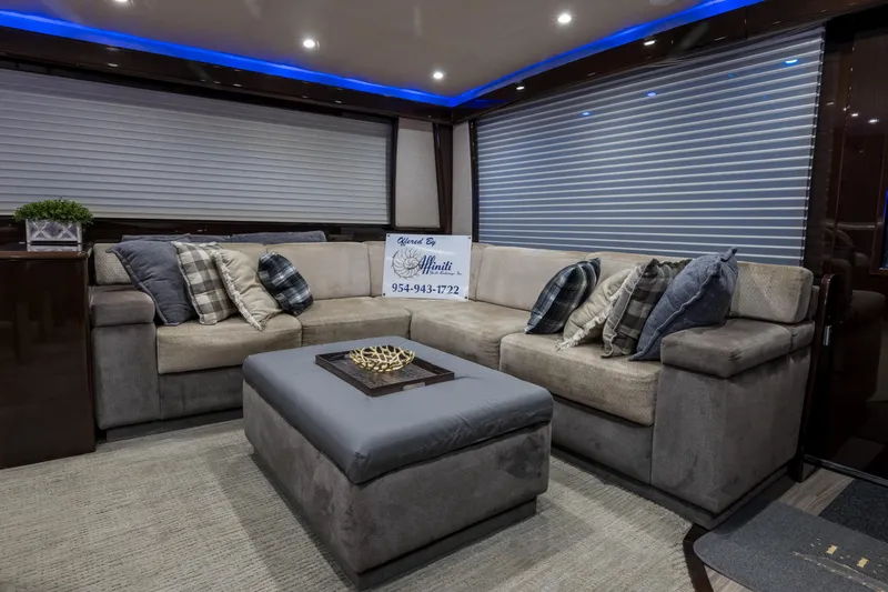 "el Jefe" Yacht Photos Pics Luxurious interior of 2014 Viking 70 Convertible yacht with plush seating and modern decor.