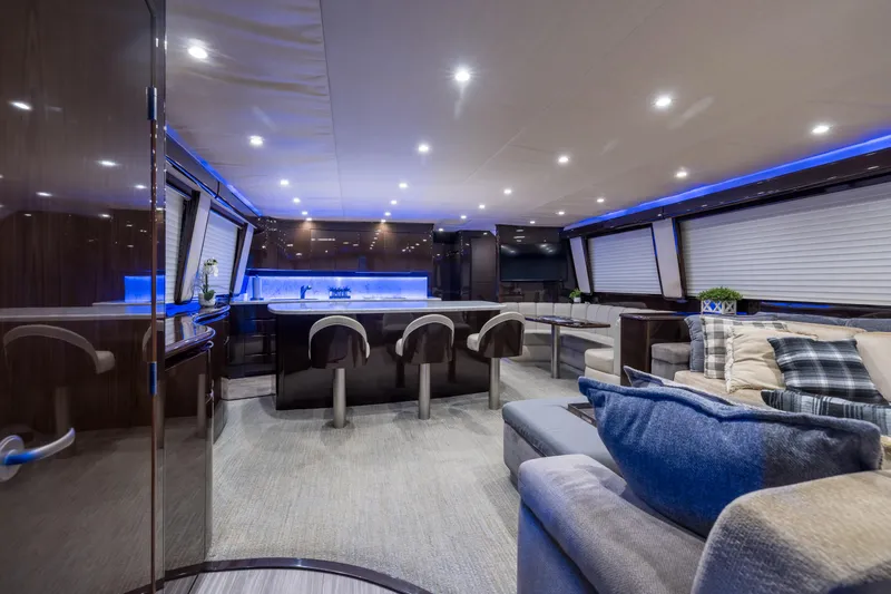 "el Jefe" Yacht Photos Pics Luxurious interior of 2014 Viking 70 Convertible yacht with modern seating and ambient lighting.