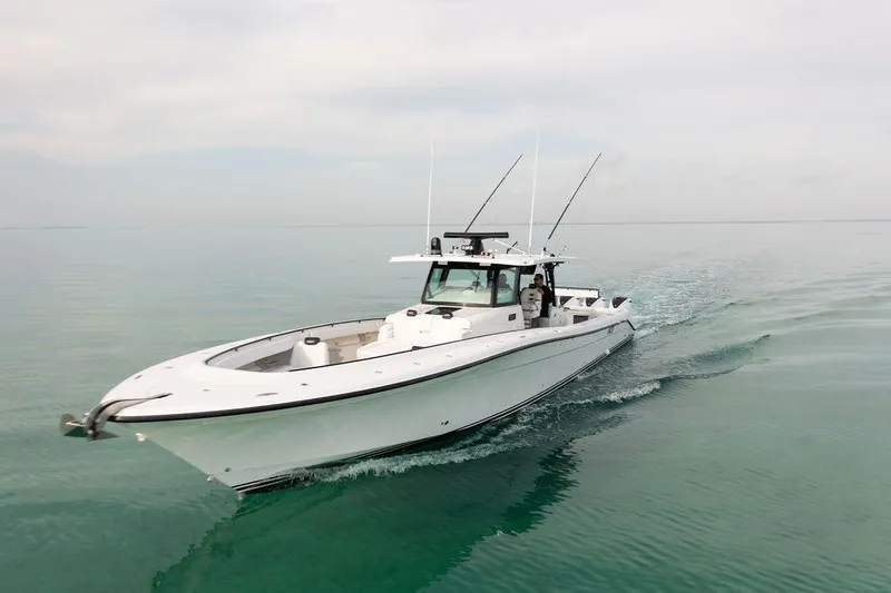  Yacht Photos Pics 2019 HCB 53 boat cruising on calm waters, showcasing sleek design and advanced features.
