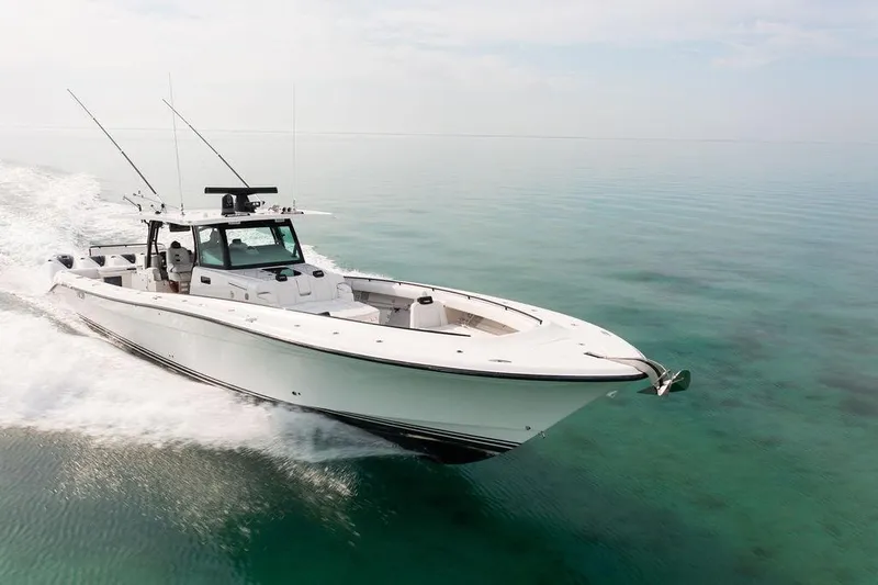  Yacht Photos Pics 2019 HCB 53 boat cruising on clear, calm waters.