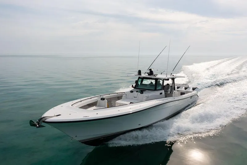  Yacht Photos Pics 2019 HCB 53 boat cruising on calm ocean waters.