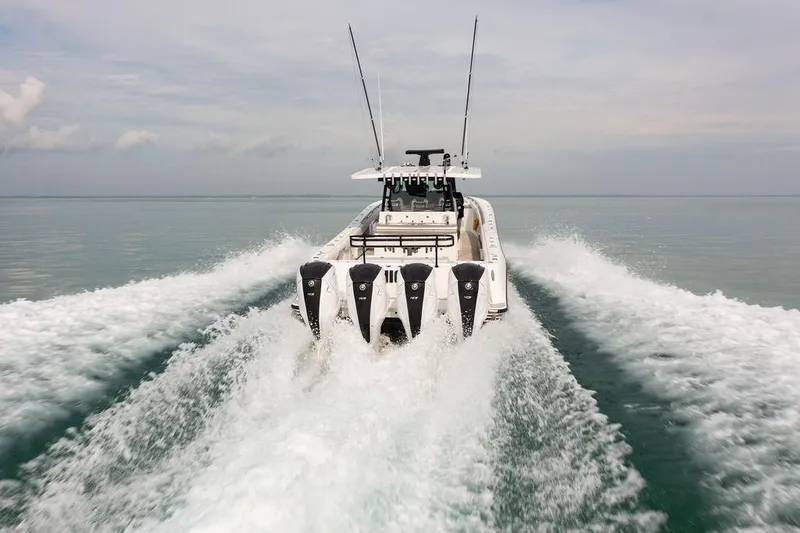  Yacht Photos Pics 2019 HCB 53 boat cruising on open water with powerful engines.
