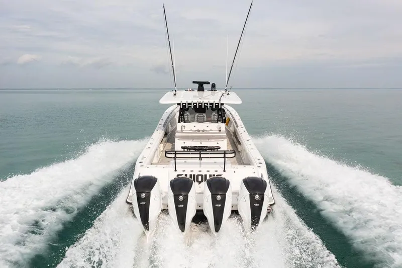  Yacht Photos Pics 2019 HCB 53 boat with four engines cruising on open water.