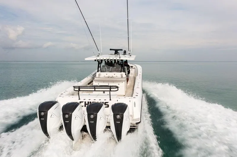  Yacht Photos Pics 2019 HCB 53 boat with four engines cruising on open water.