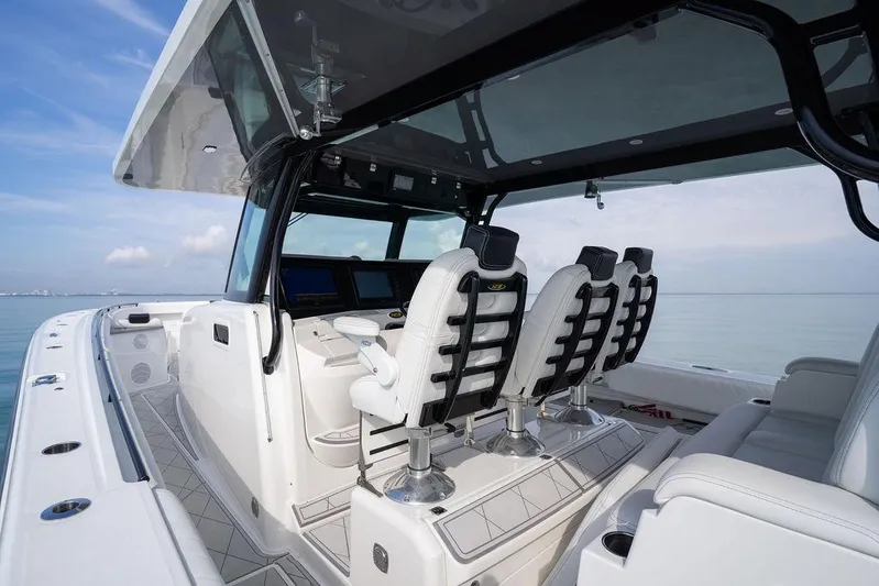  Yacht Photos Pics 2019 HCB 53 boat interior with modern seating and navigation equipment.