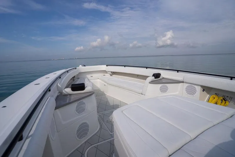  Yacht Photos Pics 2019 HCB 53 boat interior with white seating, open sea view, and clear sky.