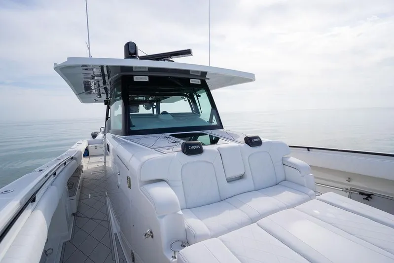 Yacht Photos Pics 2019 HCB 53 yacht with sleek design and luxurious seating on calm waters.