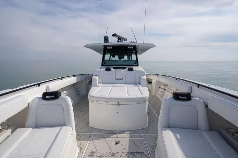  Yacht Photos Pics 2019 HCB 53 boat with spacious seating and modern design on calm waters.