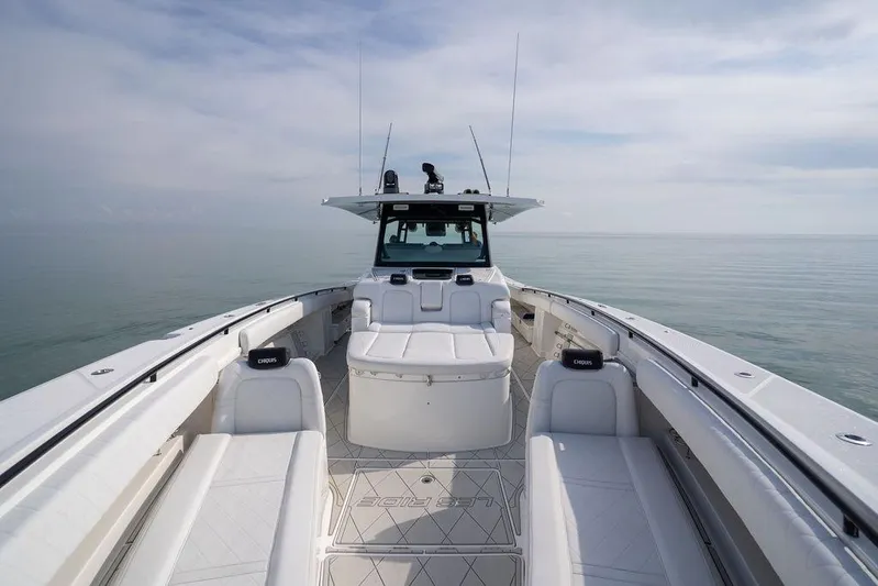 Yacht Photos Pics 2019 HCB 53 boat with spacious deck and seating on calm water.