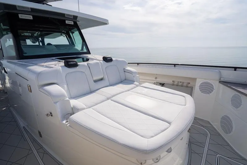  Yacht Photos Pics Luxurious seating on a 2019 HCB 53 yacht with ocean view.