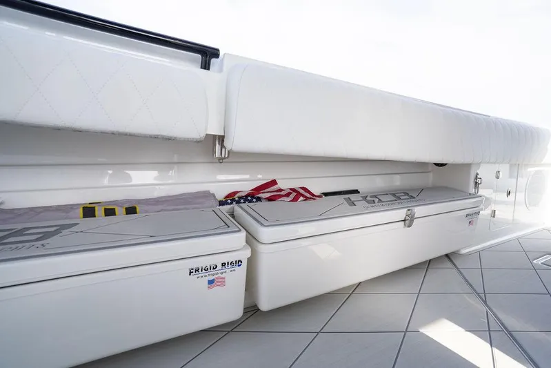  Yacht Photos Pics 2019 HCB 53 boat interior with storage compartments and American flag.