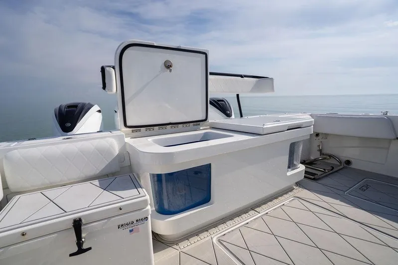  Yacht Photos Pics 2019 HCB 53 boat deck with storage compartments and ocean view.