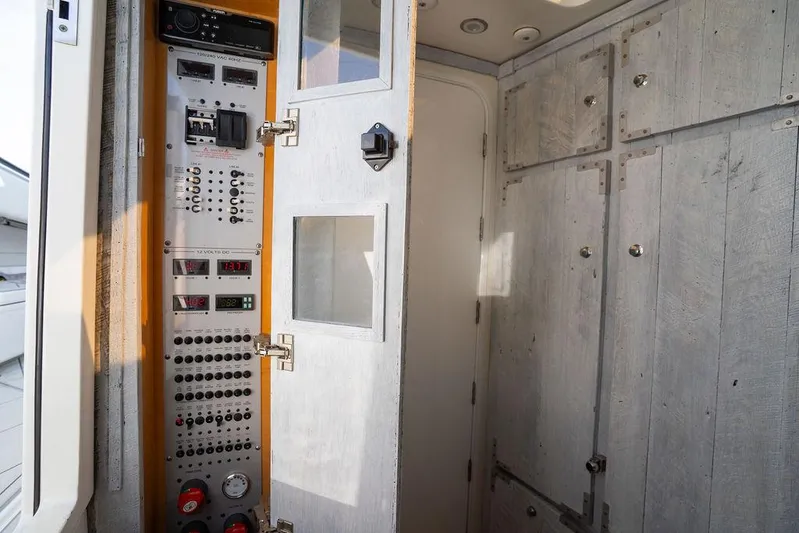  Yacht Photos Pics Electrical panel inside a 2019 HCB 53 boat, featuring switches and controls.