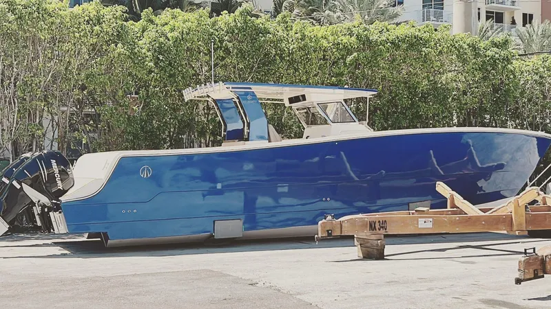 Sec Catfish 39 Yacht Photos Pics Custom Catamaran Sec CatFish 39, 2023 model, blue hull, docked outdoors.