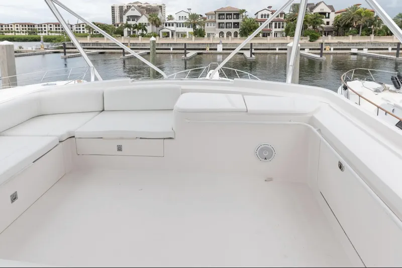  Yacht Photos Pics Spacious deck of 2004 Bertram 630 yacht docked at marina.