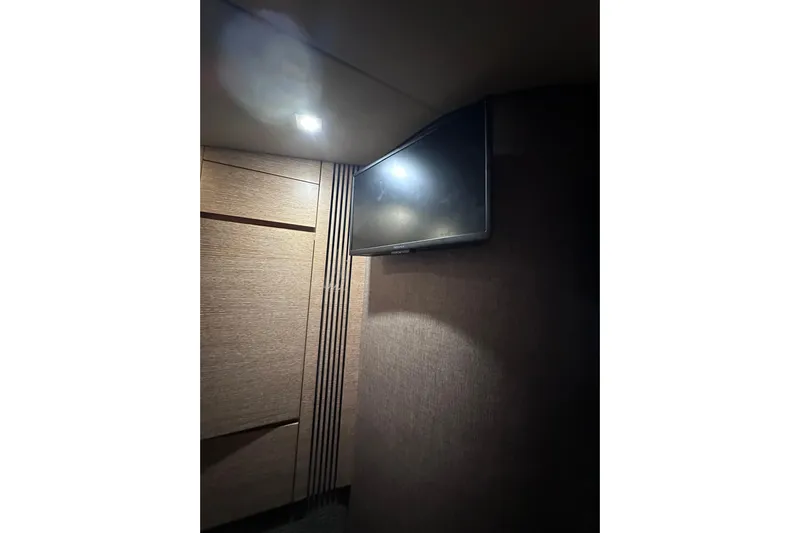 3 Princess Yacht Photos Pics Interior of 2011 Azimut 38 yacht with wall-mounted TV and modern lighting.