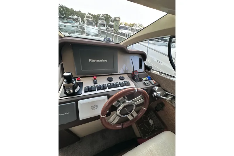 3 Princess Yacht Photos Pics Helm of 2011 Azimut 38 yacht with Raymarine navigation system.