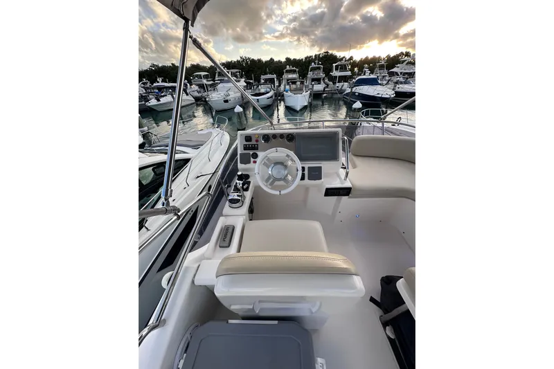 3 Princess Yacht Photos Pics Cockpit view of 2011 Azimut 38 yacht at marina, surrounded by boats.