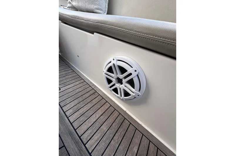 3 Princess Yacht Photos Pics Speaker on Azimut 38 yacht, 2011 model, with wooden deck and cushioned seating.