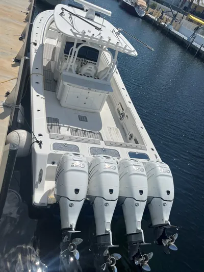  Yacht Photos Pics 2018 Blackwater 43 boat with four powerful outboard engines docked at marina.