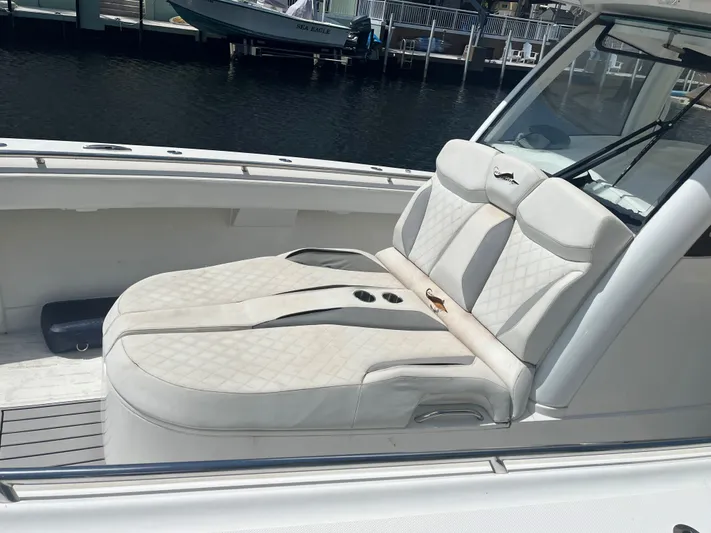  Yacht Photos Pics Luxurious seating on a 2018 Blackwater 43 boat, featuring elegant white upholstery.