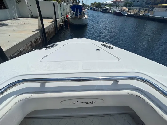  Yacht Photos Pics Bow view of a 2018 Blackwater 43 boat docked in a canal.
