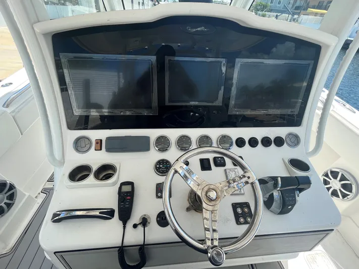  Yacht Photos Pics Control panel of a 2018 Blackwater 43 boat with multiple screens and gauges.