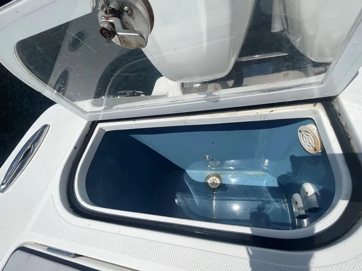  Yacht Photos Pics Open storage compartment on a 2018 Blackwater 43 boat, featuring a blue interior.