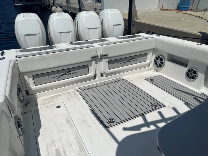  Yacht Photos Pics 2018 Blackwater 43 boat deck with four engines, docked at marina.